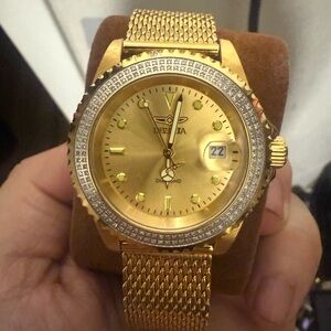 Invicta Gold men’s Elite diver watch diamond bezel on diver mesh strap